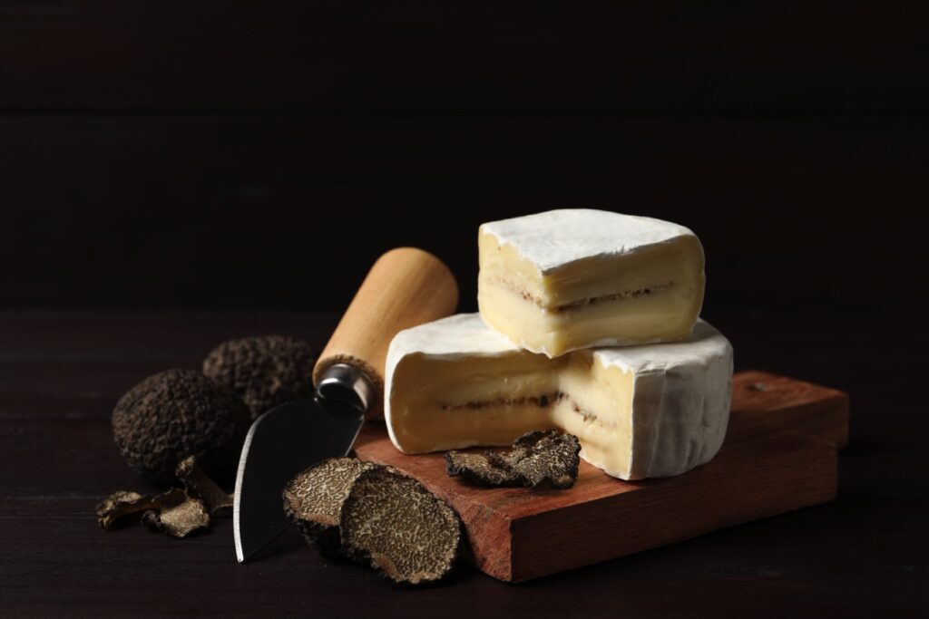 Truffle Cheese explore the luxurious flavor combination of truffles and cheese Glutto Digest