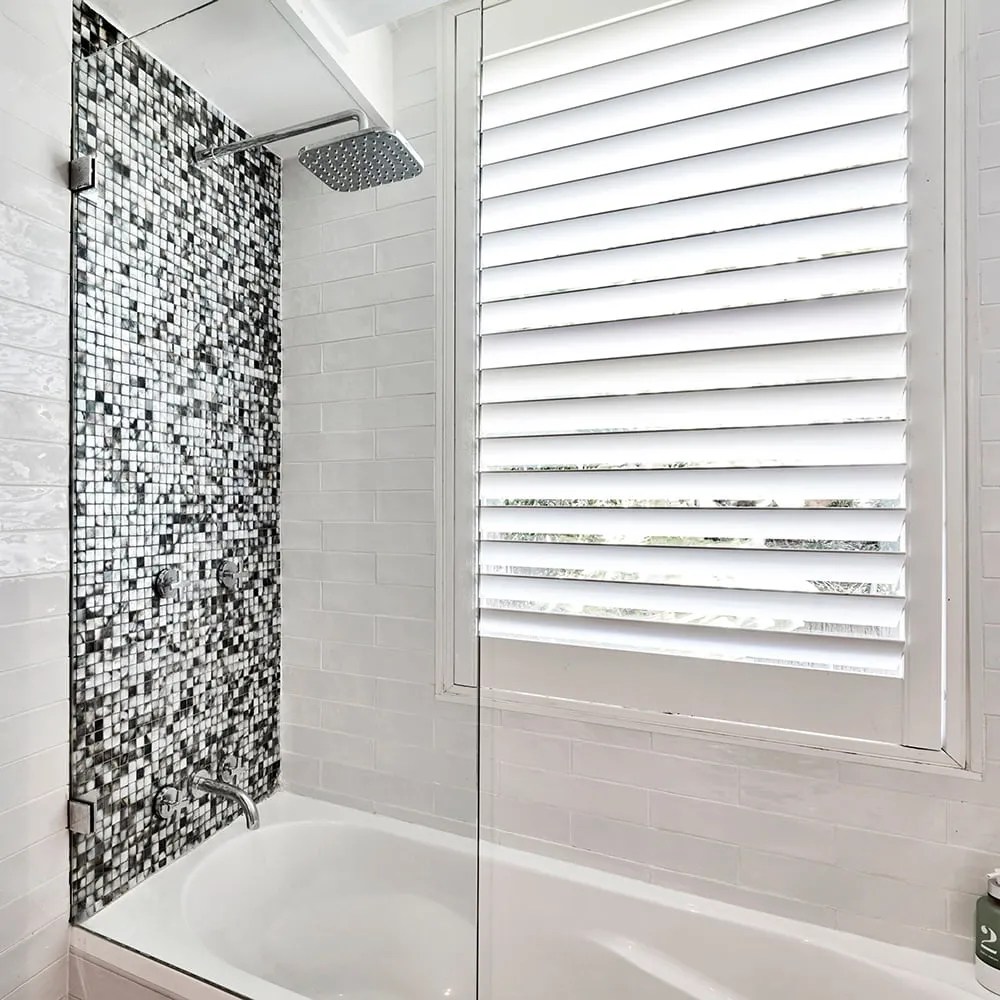 Bespoke Hinged Glass Bath Screens