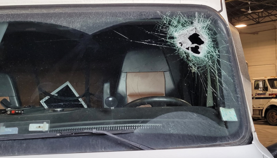 A chunk of Highway 75 flew through this truck drivers windshield