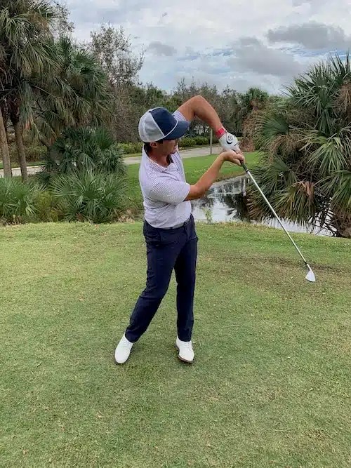 What Is A Chicken Wing Golf Swing (Causes And How To Fix It)
