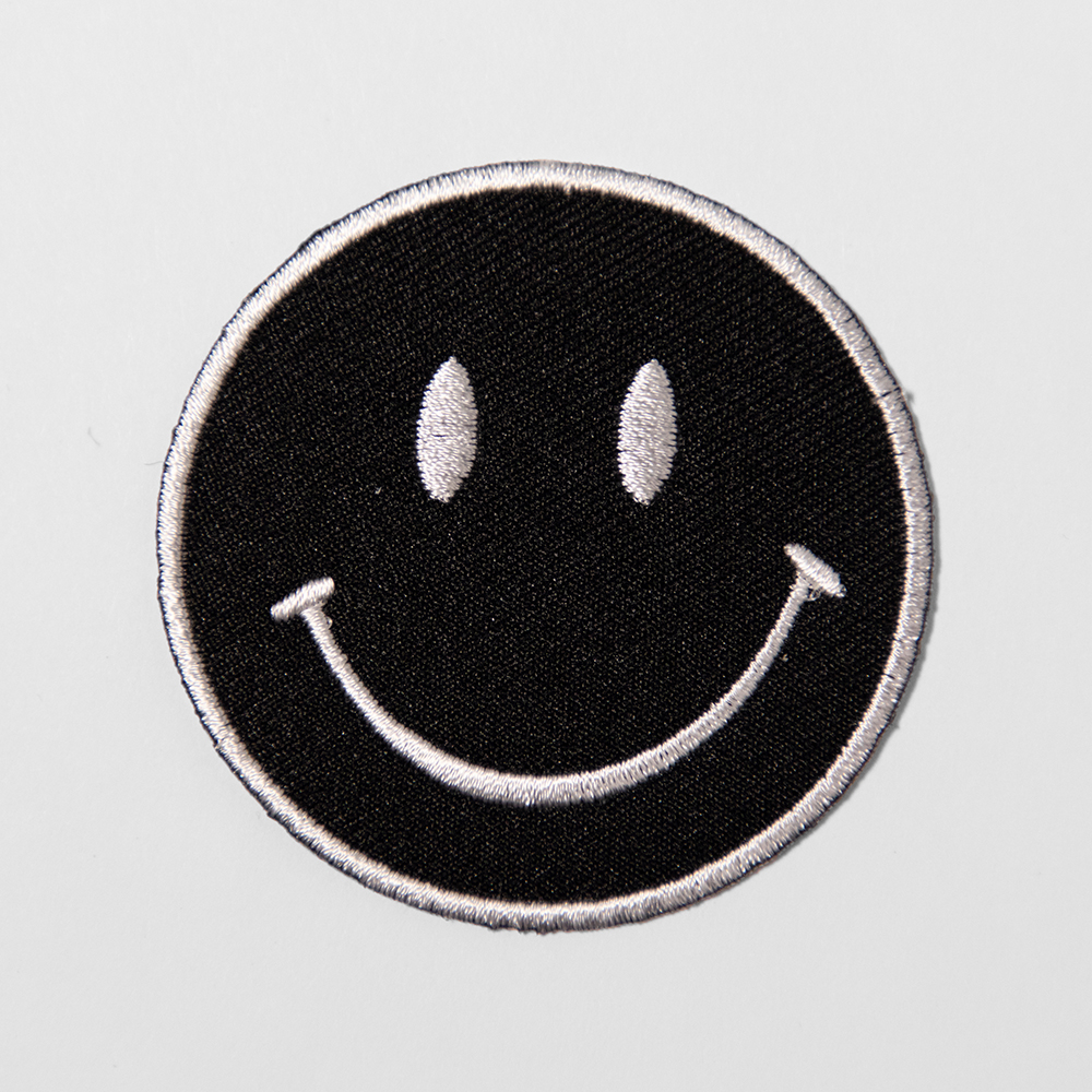 Black Smiley Face Patch Good Behavior