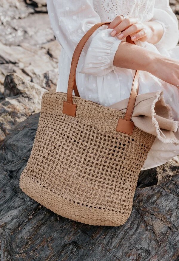 From Pineapple Leather to Plastic Bottles 19 Sustainable Bag Brands in