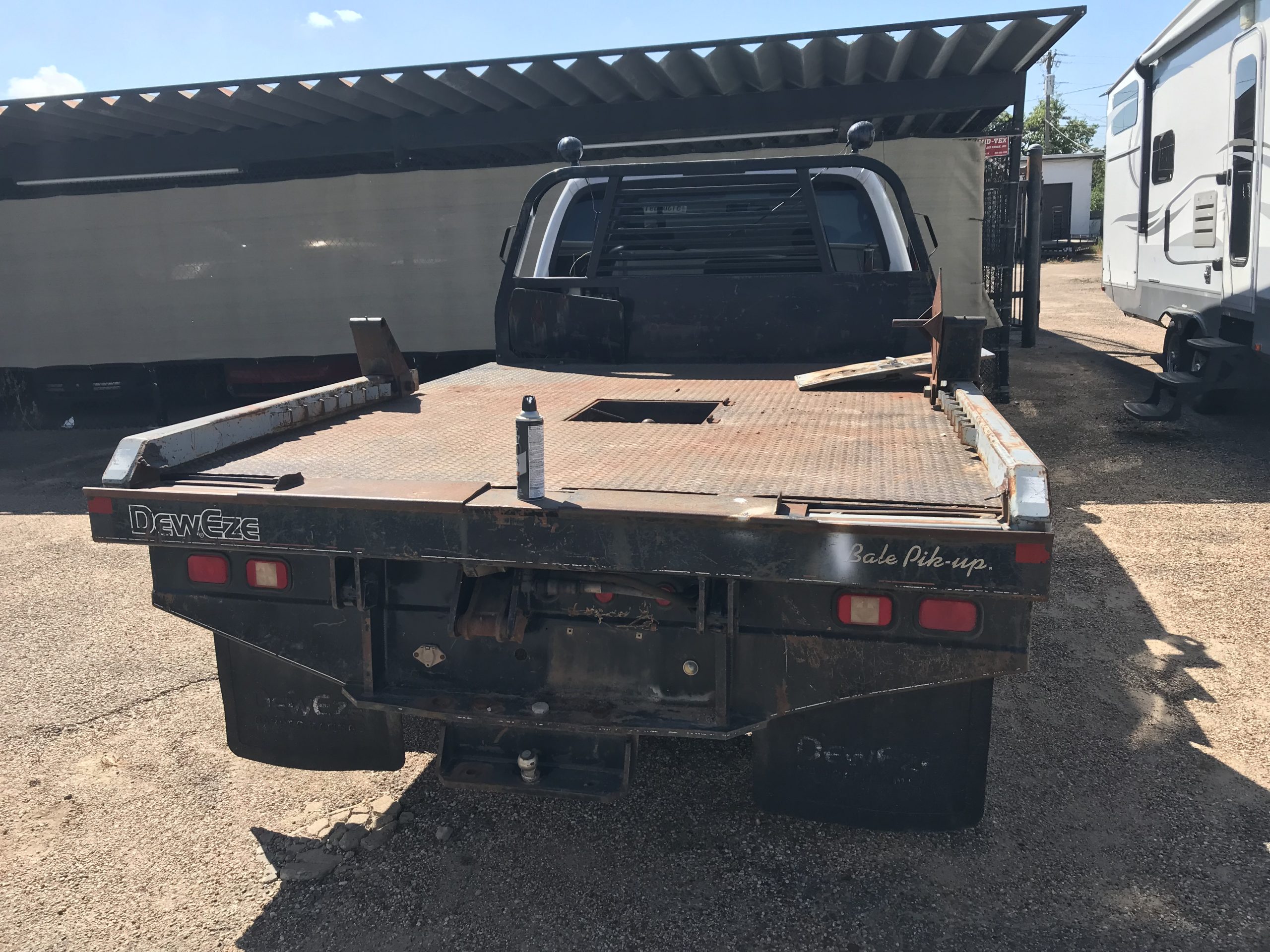  3059 Dew Eze Hydraulic Hay Bed w/ Ford F350Charlie Boiles Auto Sales