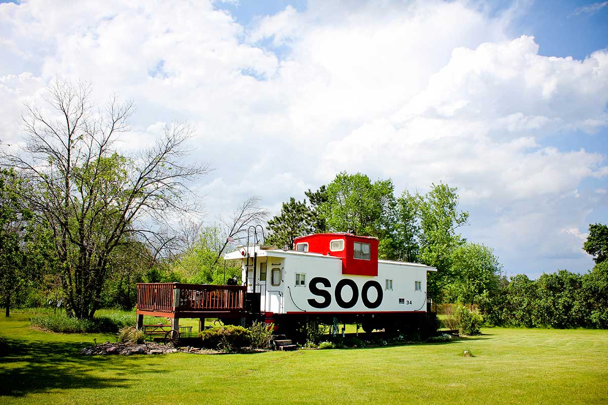 All Aboard the SOO to snooze in a Caboose Train in Sparta!