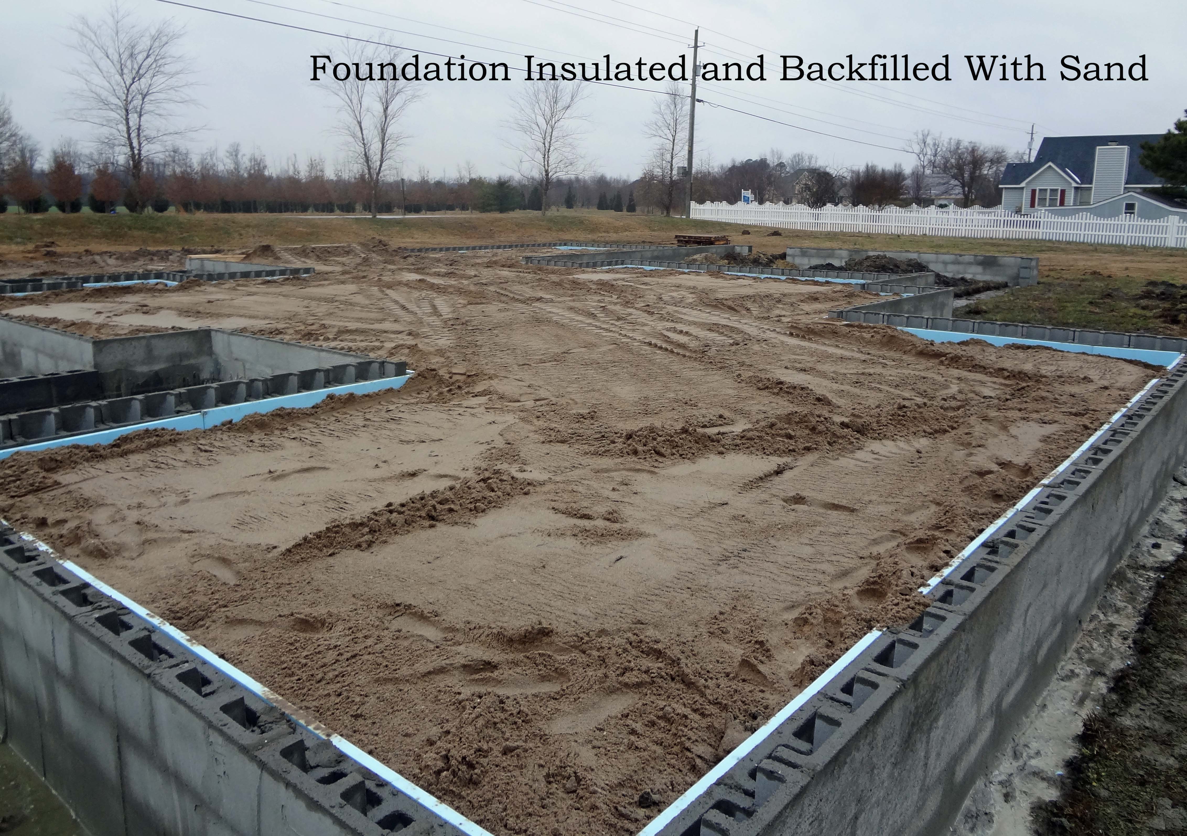Foundation backfilled with sand text Grace Construction, Inc.