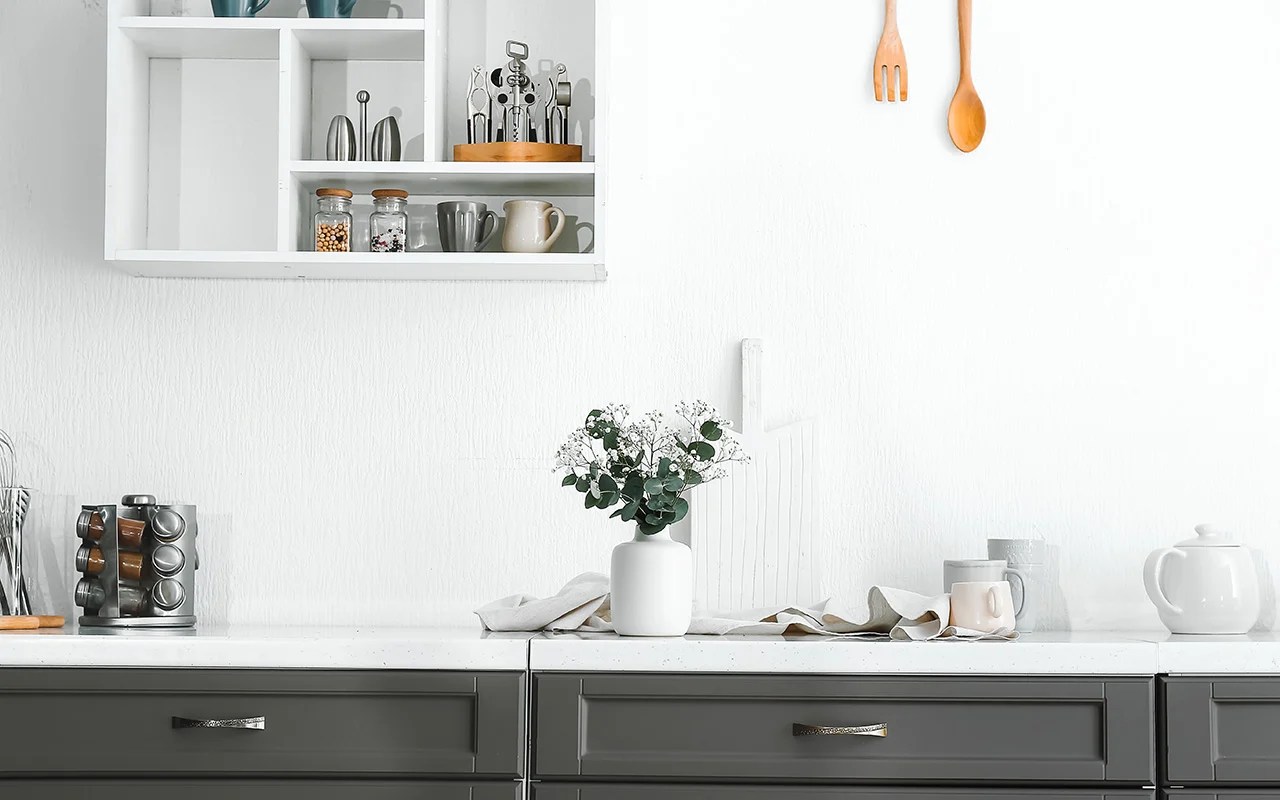 How can I protect my granite countertop from getting stained or damaged