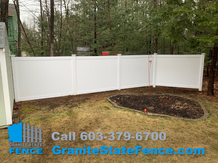 White Vinyl Privacy Fencing for a backyard in Litchfield NH Granite
