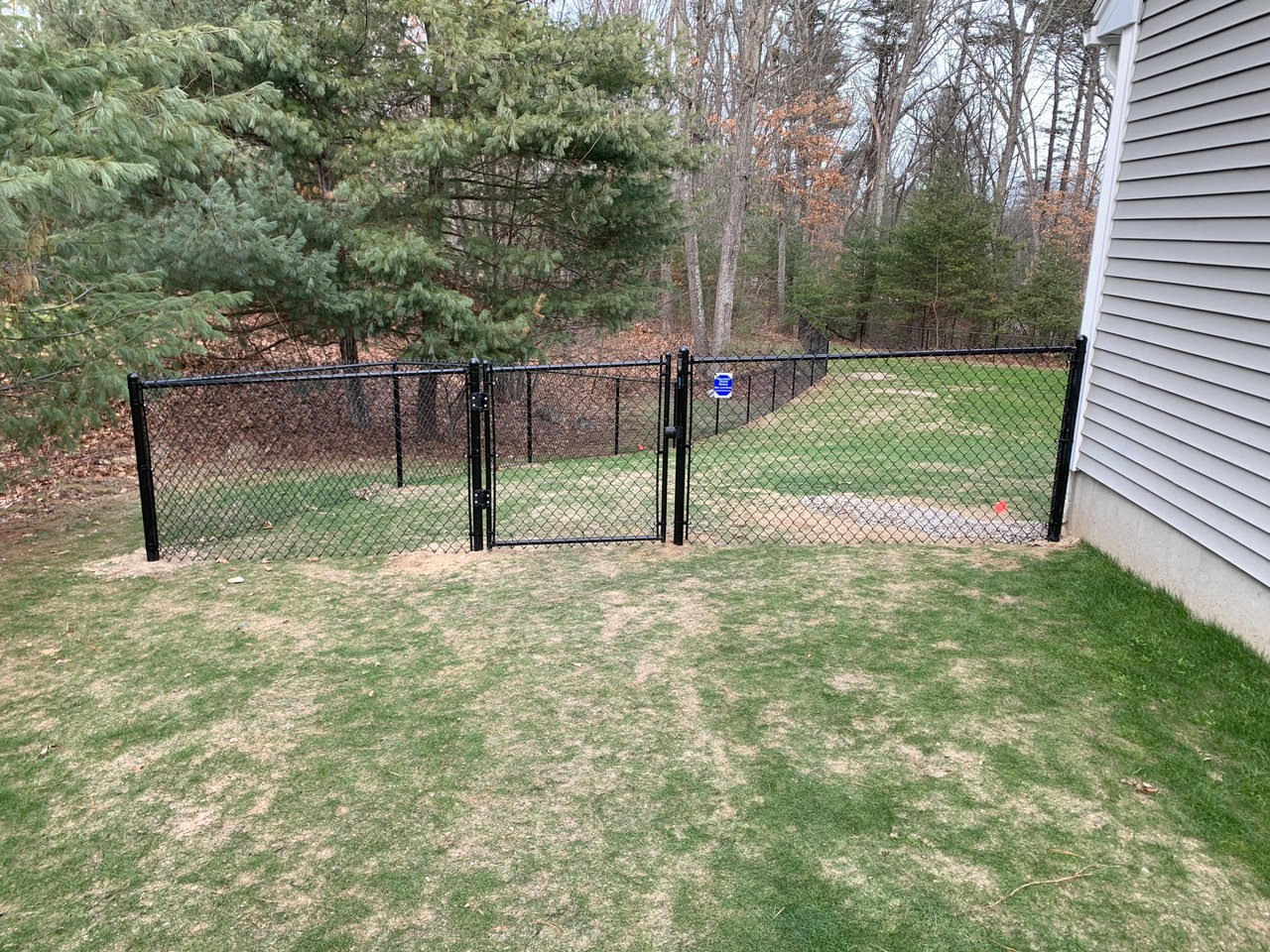 Black Chain Link Fencing installed in Pelham, NH. Granite State Fence