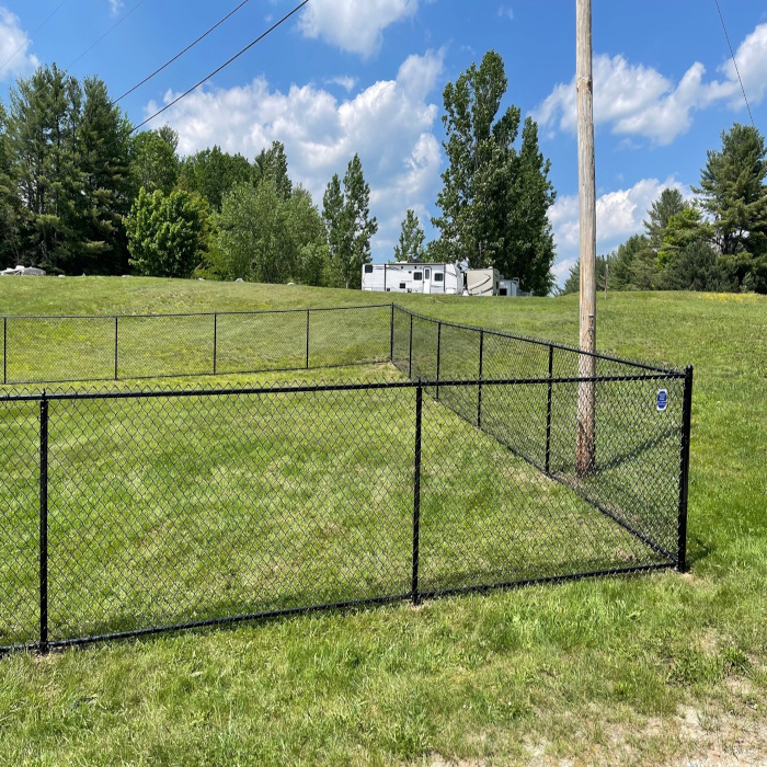 Black Chain Link Fence installed in Newport, NH. Granite State Fence