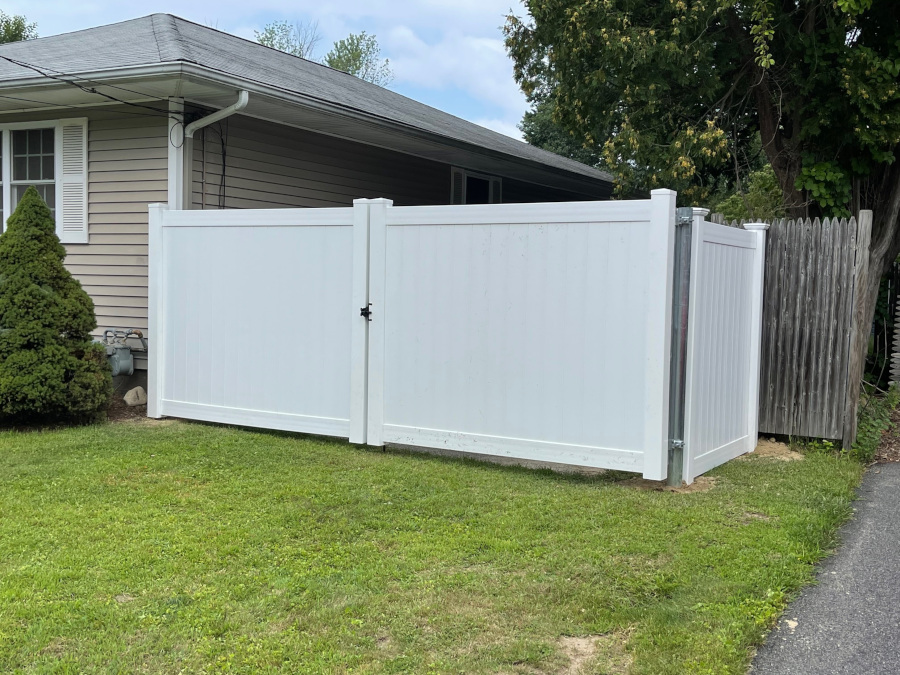 Vinyl Privacy Fence installation in Nashua, NH. Granite State Fence