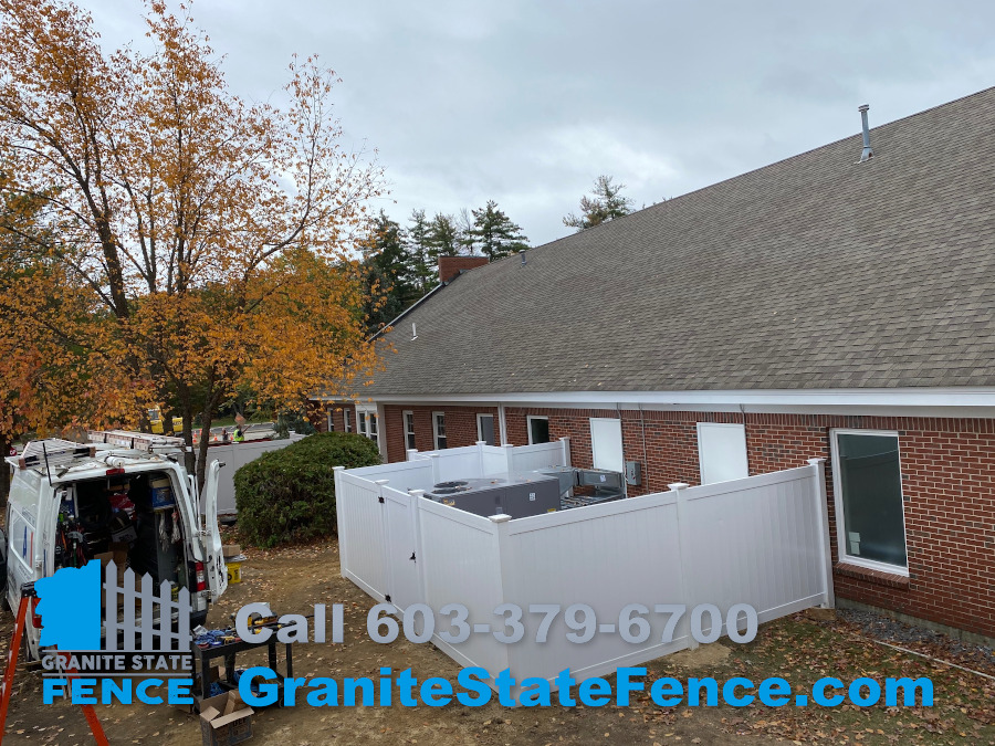 Commercial White Privacy Vinyl Fencing installed in Bedford, NH Granite State Fence