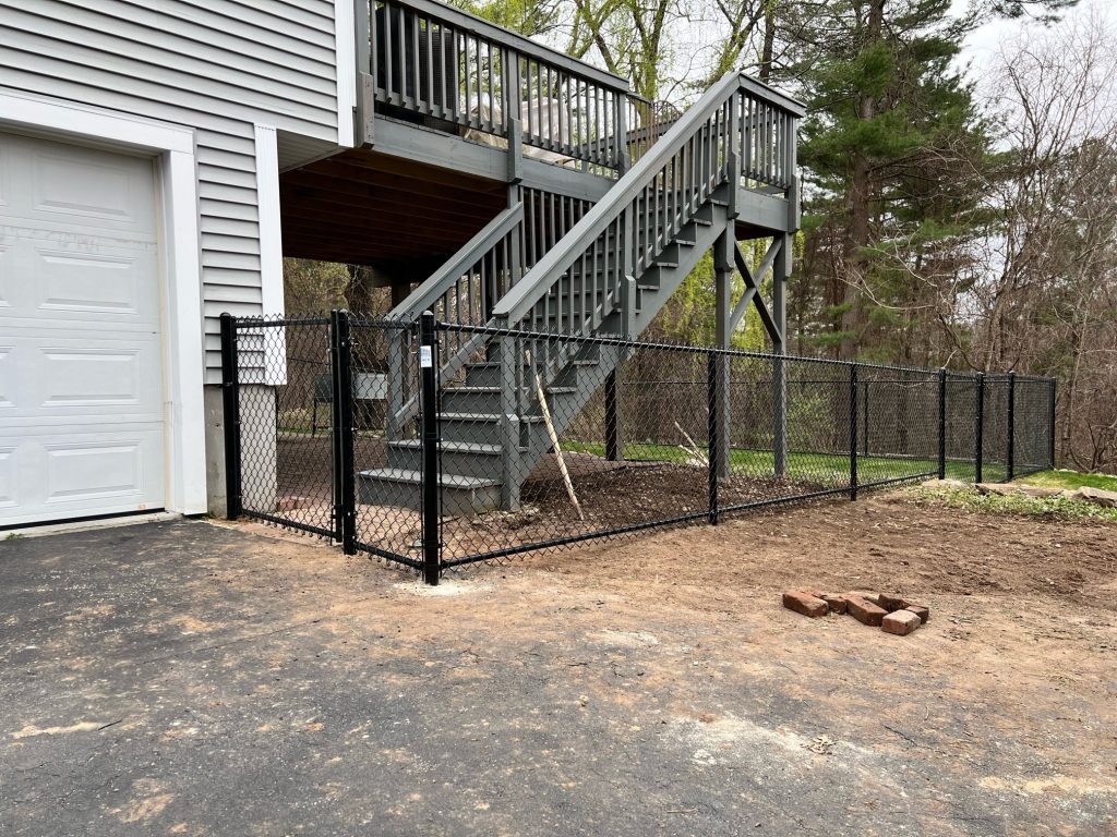 Chain Link Fence installation in Hudson, NH. Granite State Fence