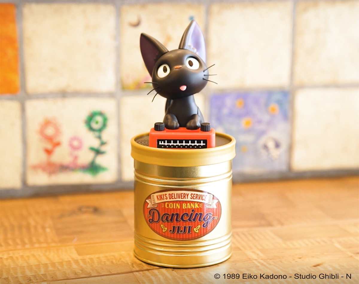 This Adorable Jiji Piggy Bank Dances and Plays Music from “Kiki’s