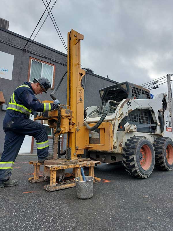 Excavator Grassroots Drilling Inc. Vancouver Island, B.C.