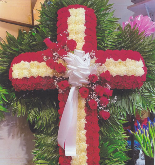 Yellow & Red Flowers & Red Roses & White Ribbon Bow Cross Arrangement