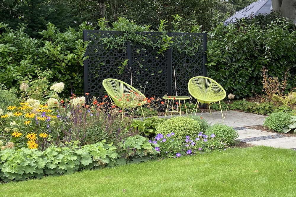 Garden design in Weybridge Surrey hot tub seating outdoor kitchen