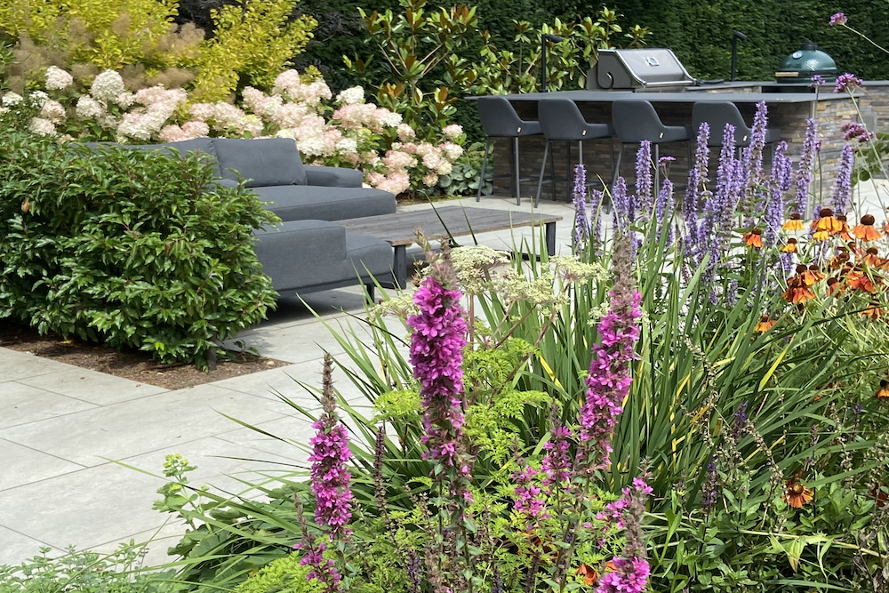 Garden design in Weybridge Surrey hot tub seating outdoor kitchen