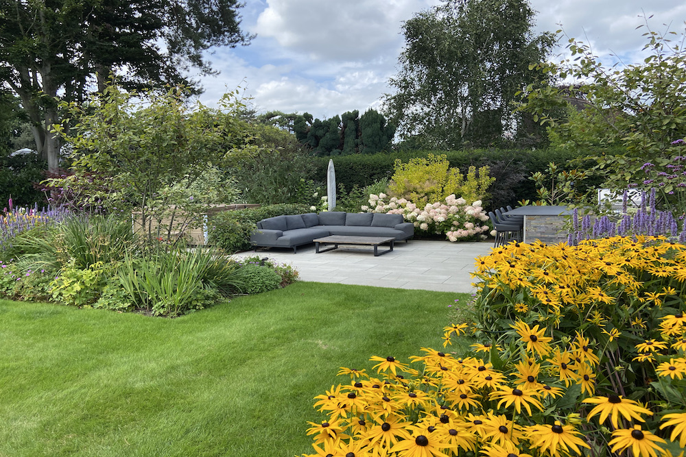 Garden design in Weybridge Surrey hot tub seating outdoor kitchen