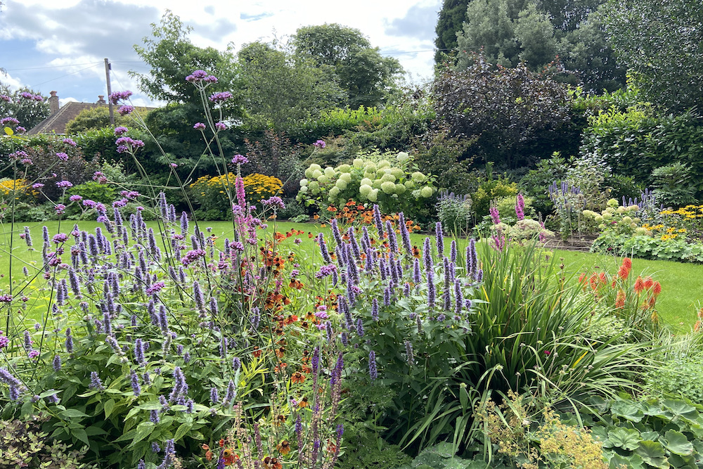 Garden design in Weybridge Surrey hot tub seating outdoor kitchen