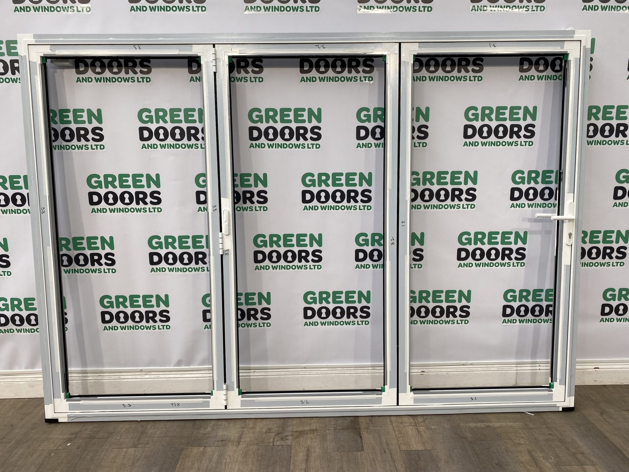 ALUK Aluminium White Bifolding Doors Green doors