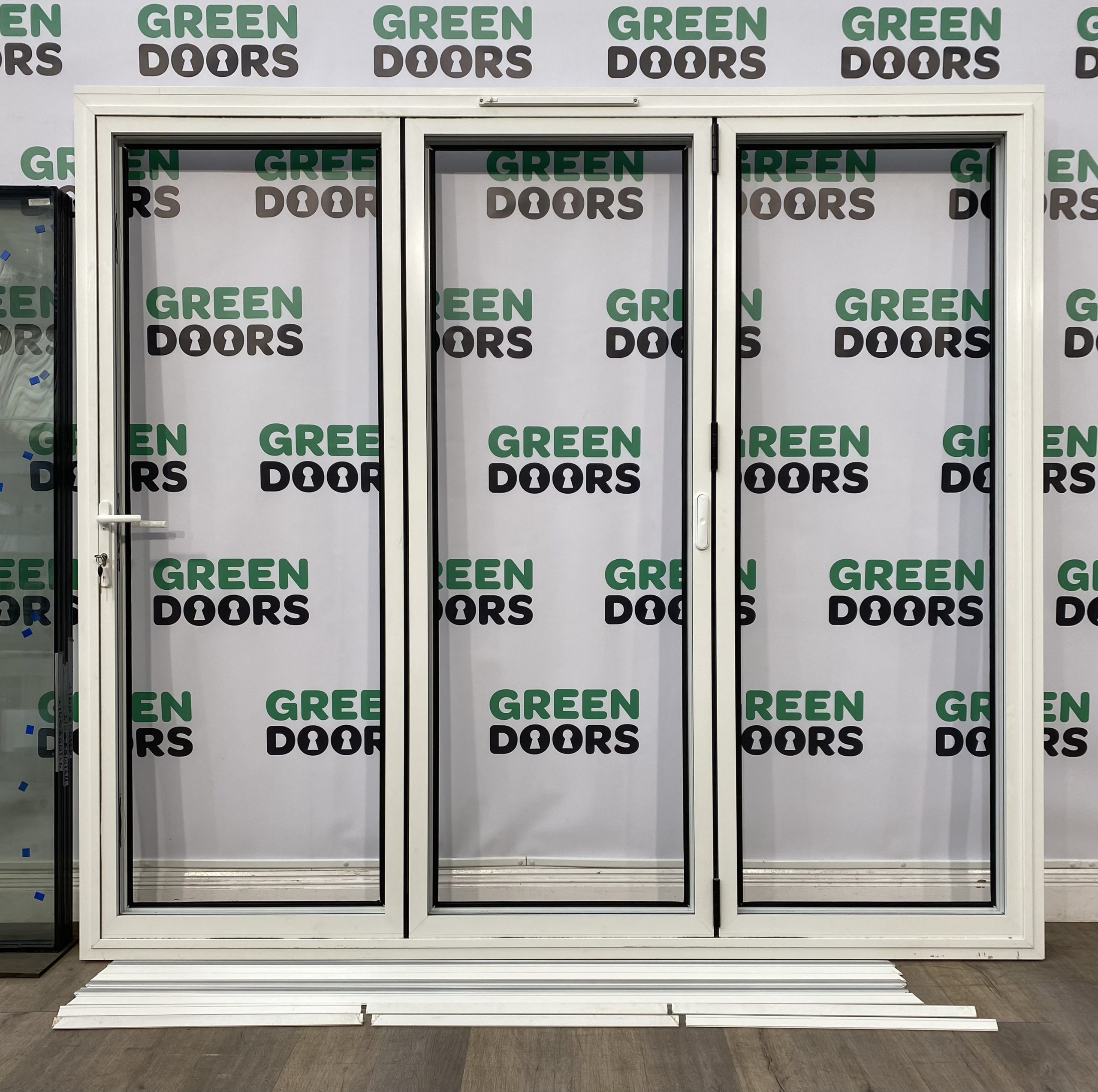 ALUK Aluminium White Bifolding Doors Green doors