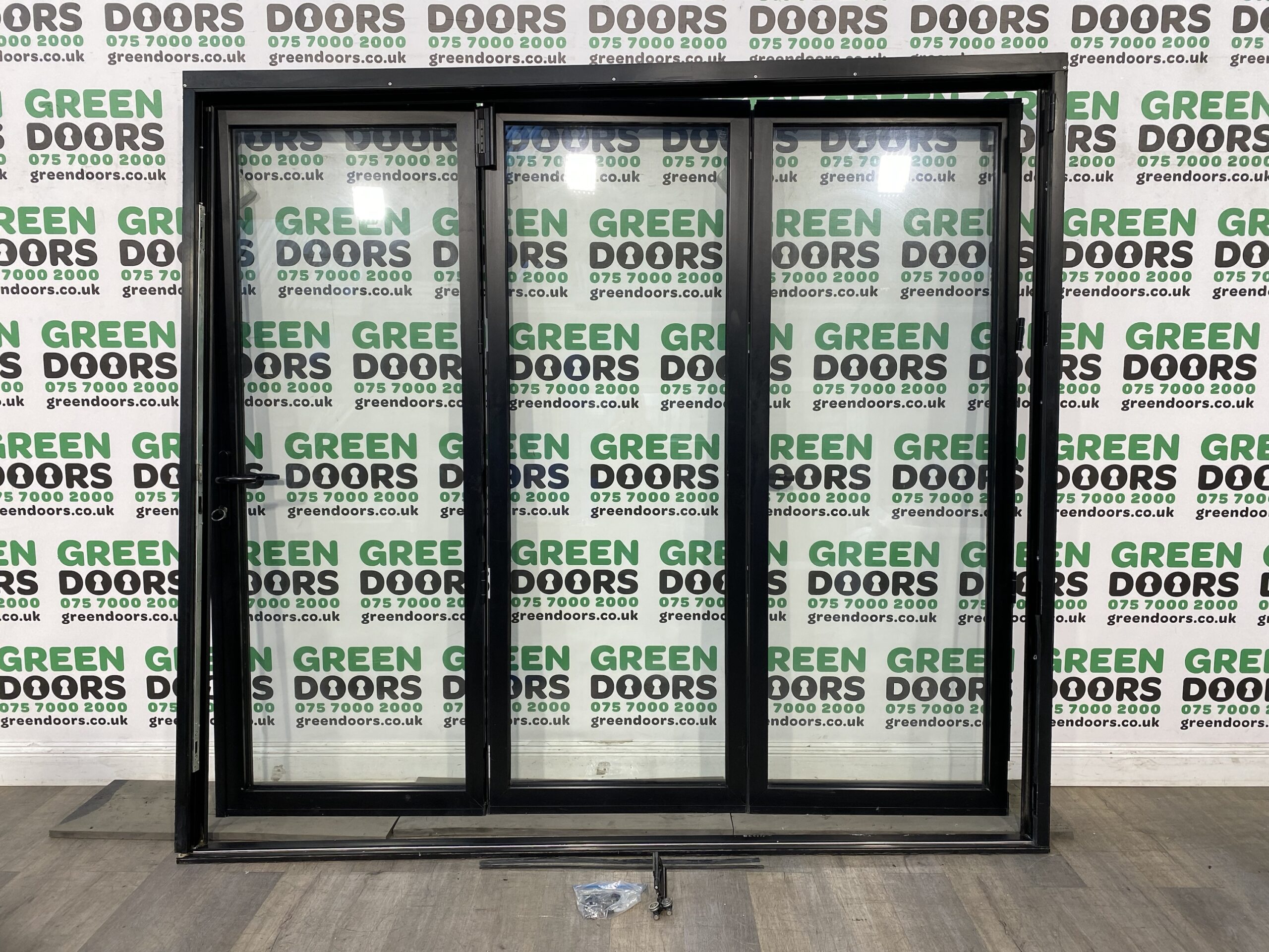 Alutech Aluminium Black Bifolding Doors Green doors