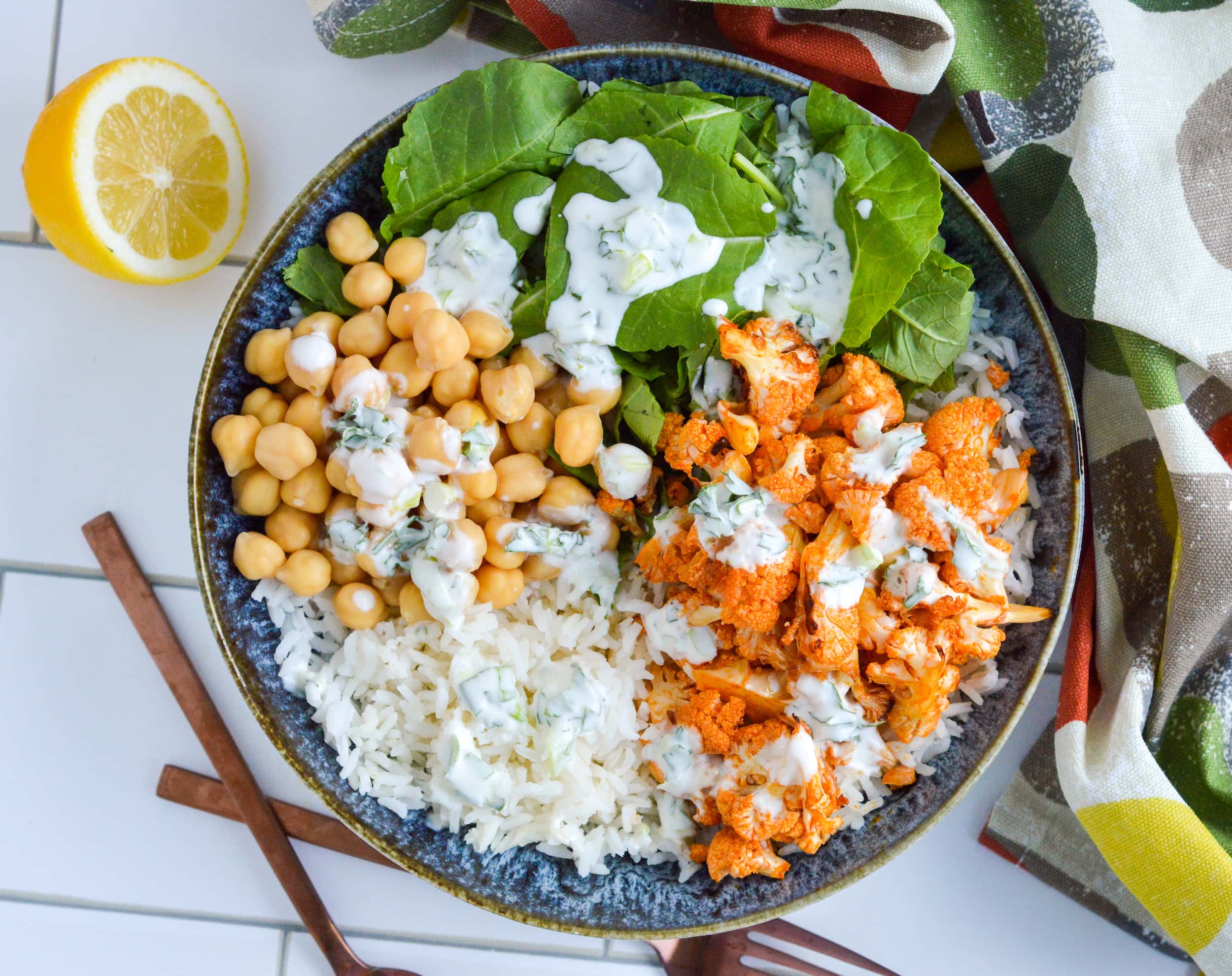 Buffalo Cauliflower Jasmine Rice Bowl with Creamy Herb Dressing