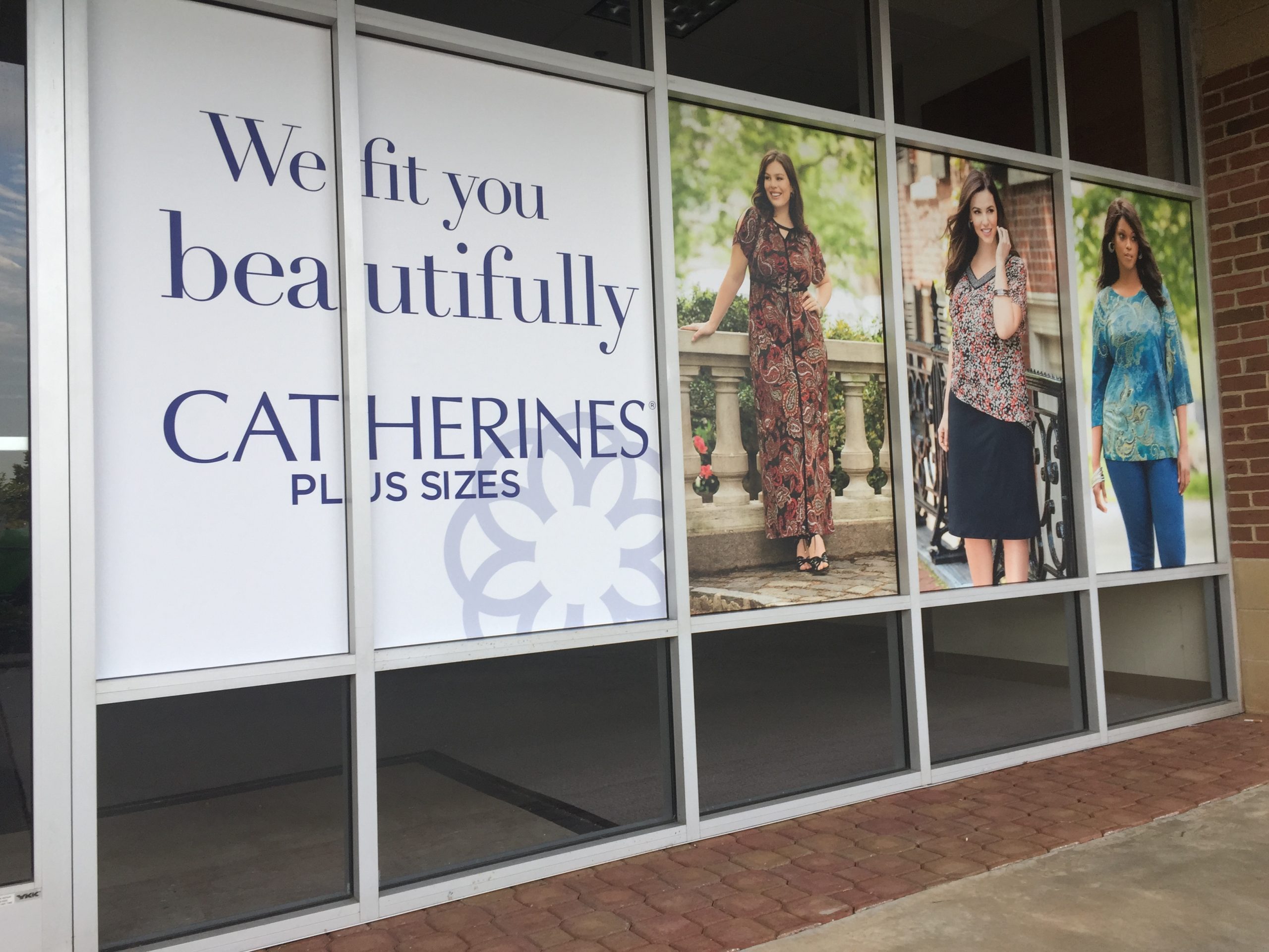 Catherines Vinyl Wrap on Business Front Windows Green Light Graphics