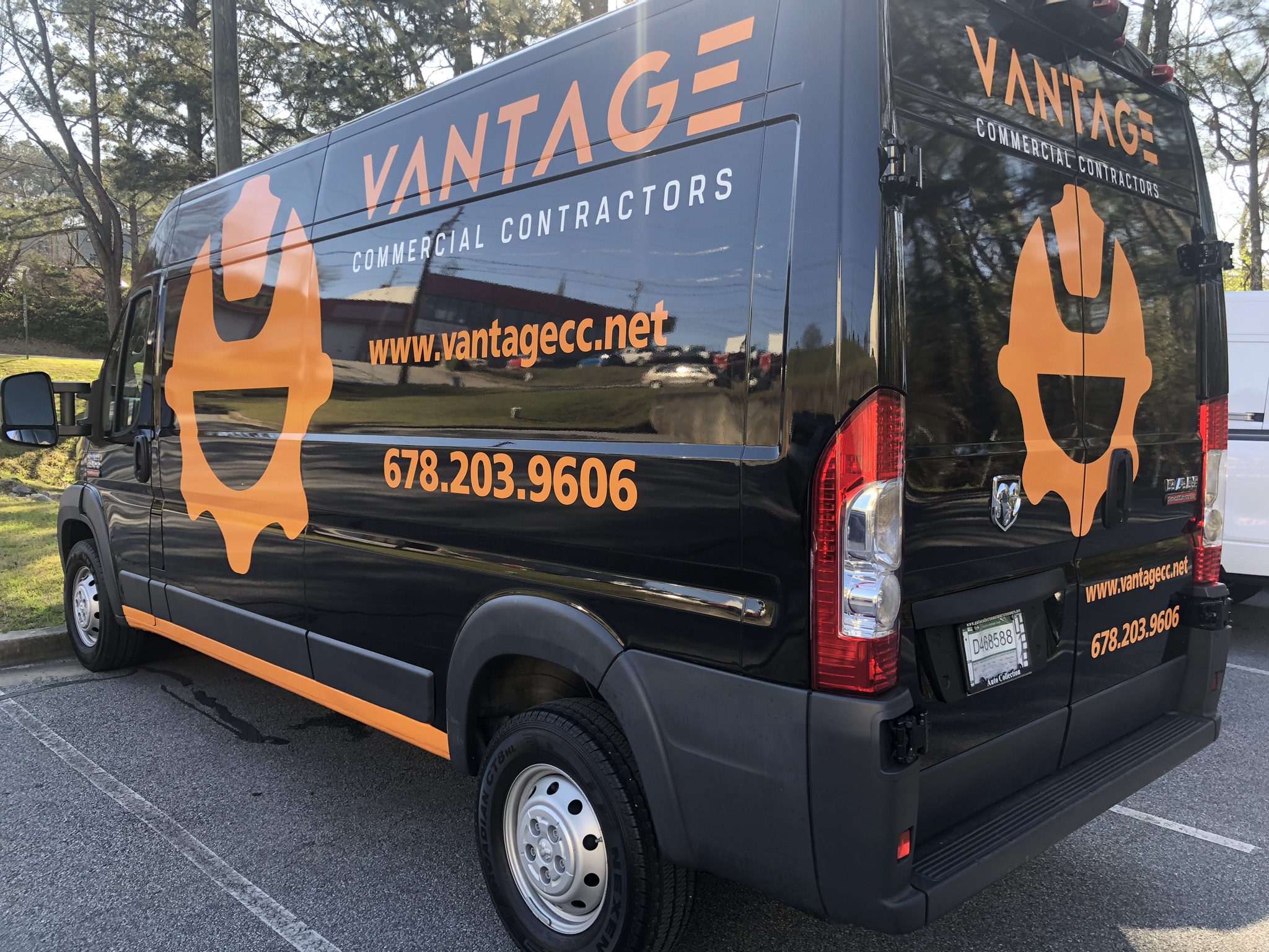 Vantage Contractors Vinyl Wrap on Van Green Light Graphics