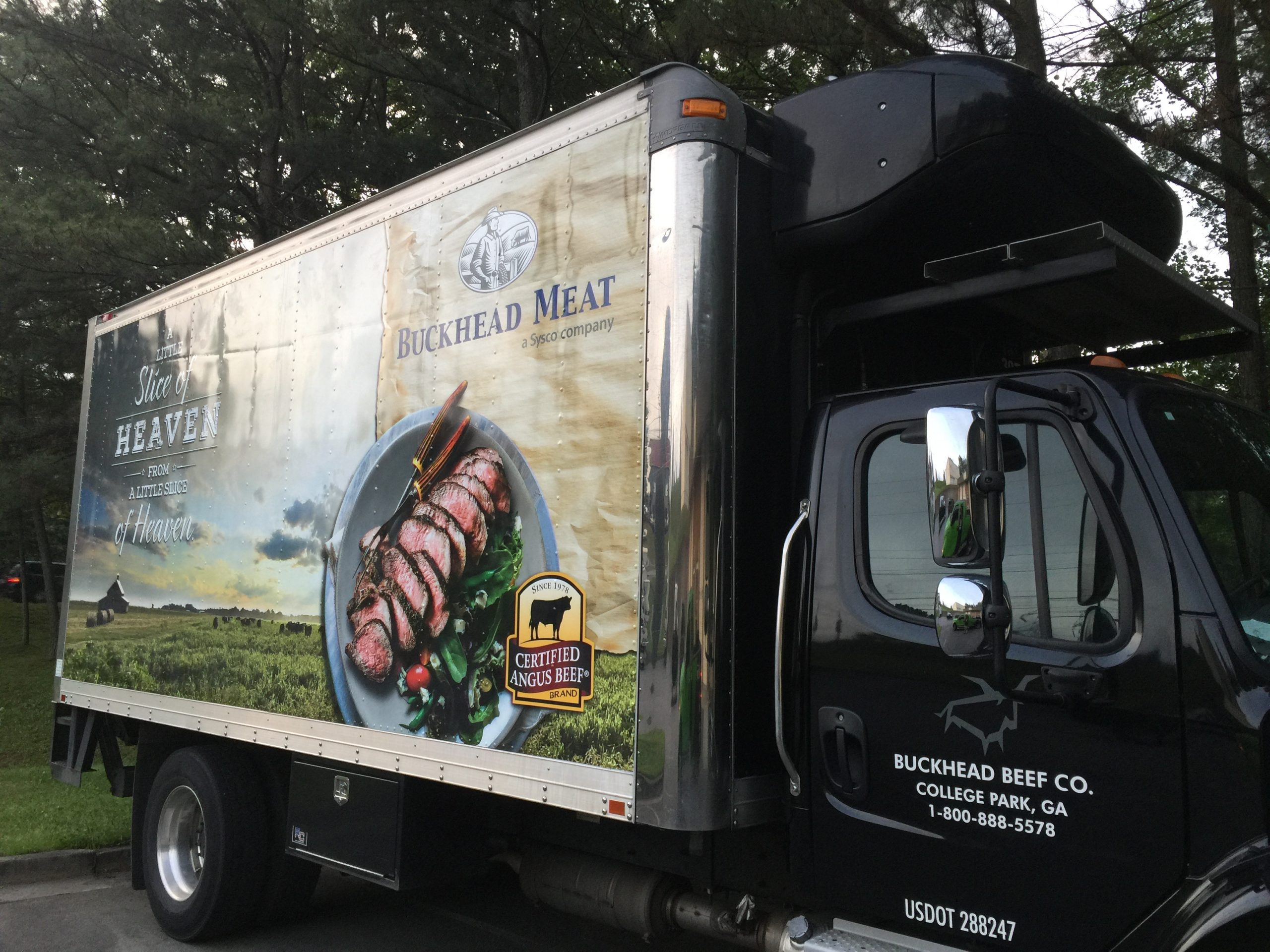Buckhead Meat Vinyl Wrap on Box Truck Green Light Graphics