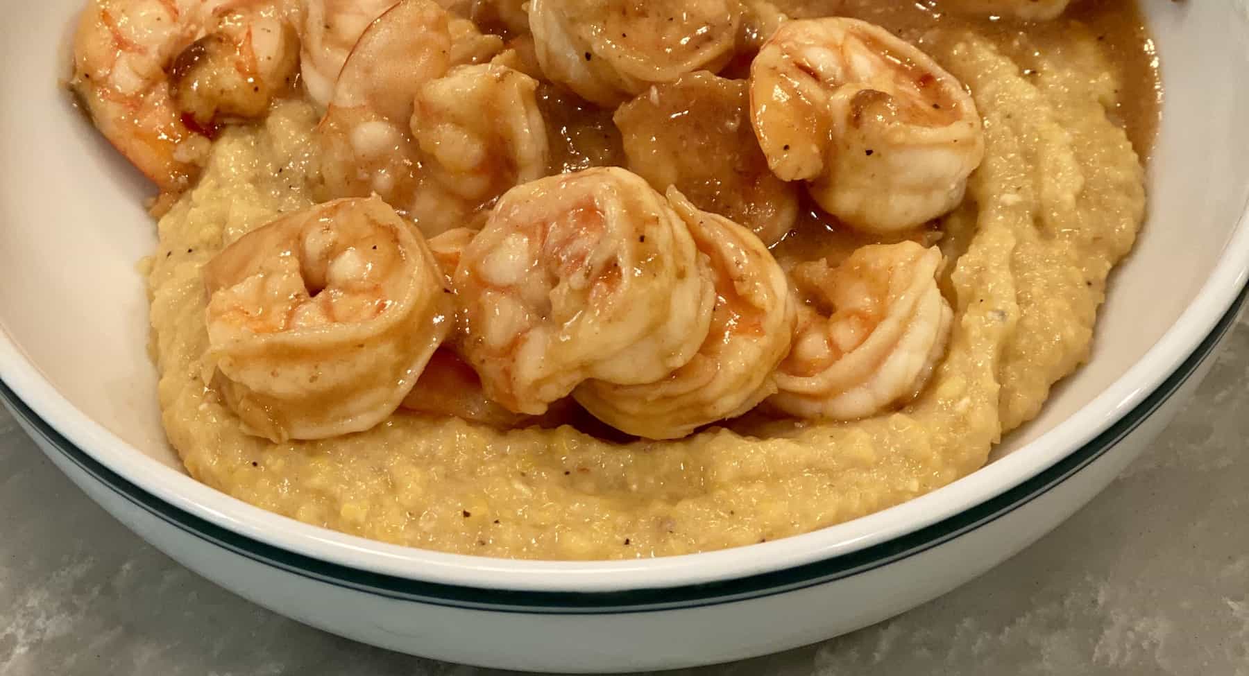 Simple Stovetop Corn Grits Made With Chicken Stock And Cheese