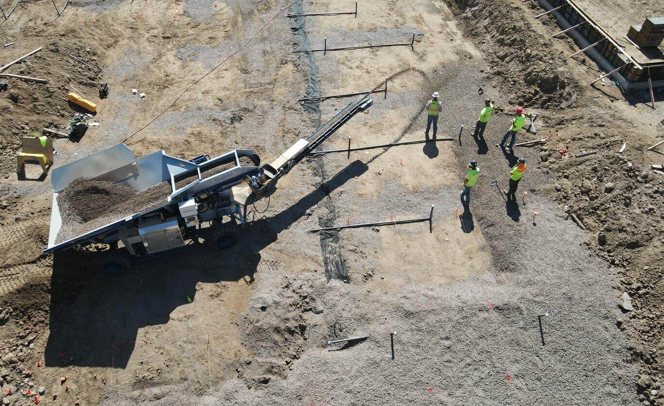 Rock and Gravel Placement using Rock Slinger Trucks Ground Solutions