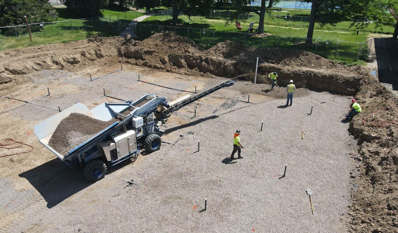 Rock and Gravel Placement using Rock Slinger Trucks Ground Solutions