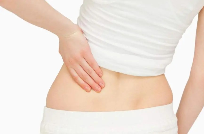 What are the two dimples on the back below the waist called? Why do