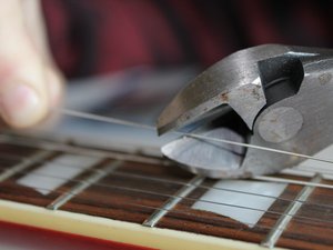 Guitar Repair Help: Learn How to Fix It Yourself.