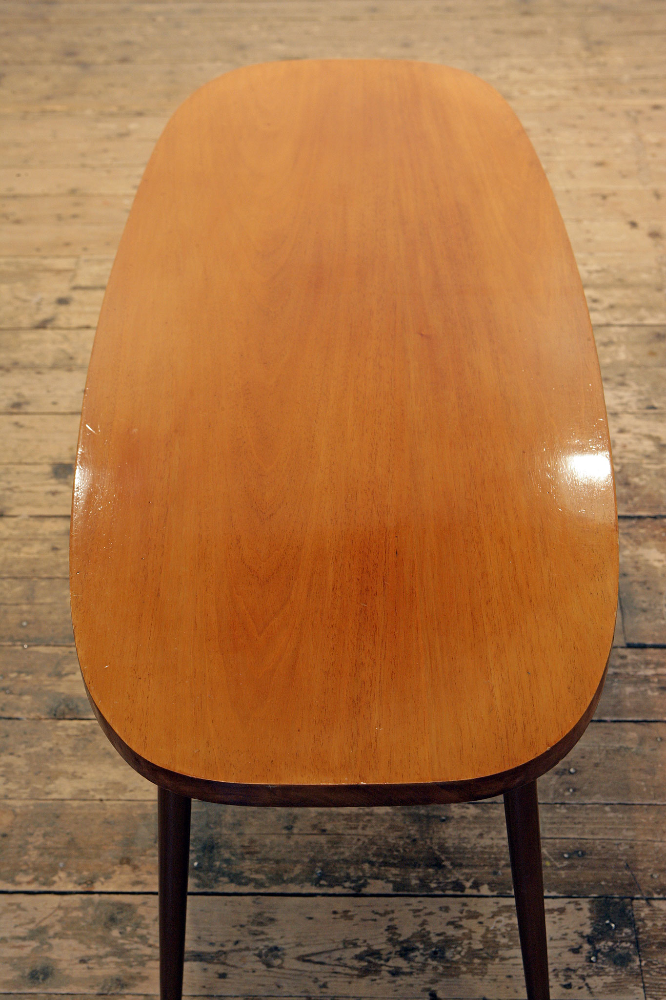 An Oval MidCentury Coffee Table with SputnikStyle legs Guild