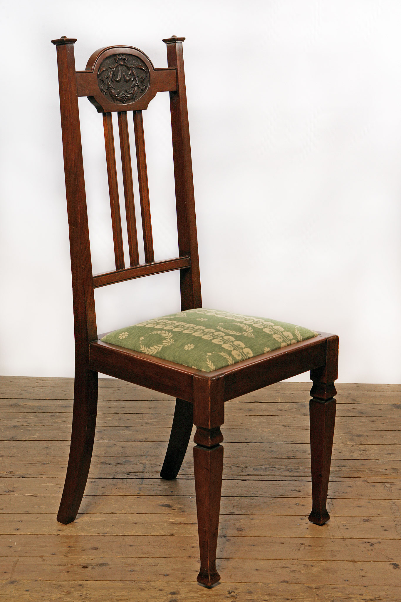 A beautifully restored, Edwardian dining chair reupholstered in an