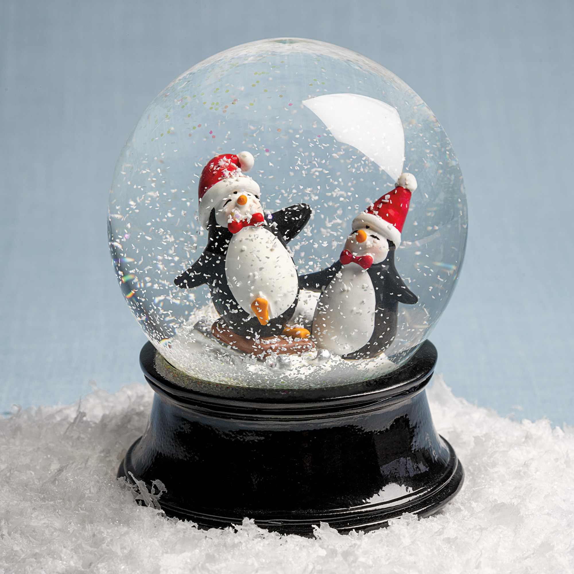 2023 Christmas Holiday Snowglobe Ornament Sledding Penguins Snowglobe Gump's