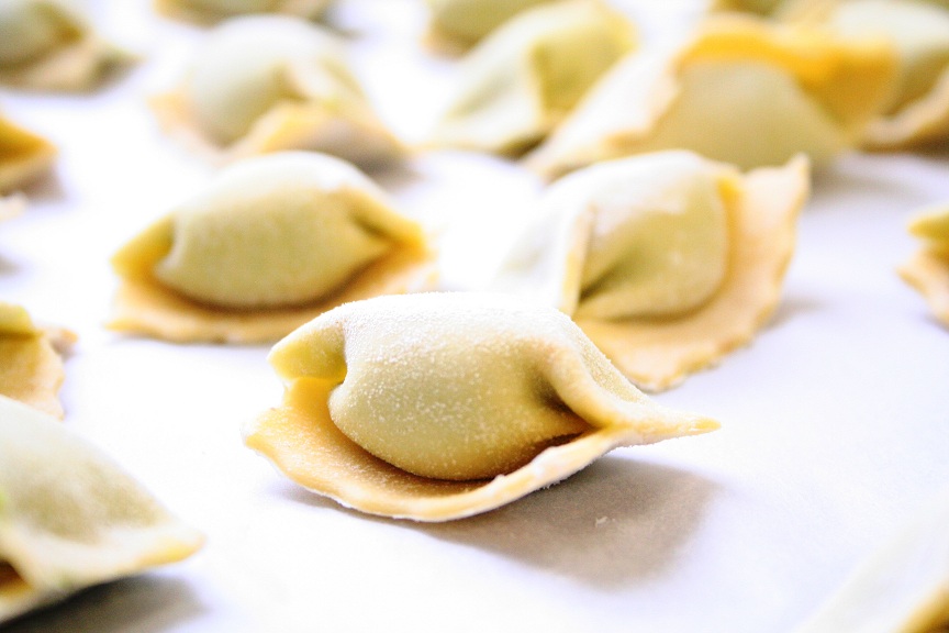 Broad Bean & Truffle Agnolotti with Roast Garlic Emulsion & Parmesan