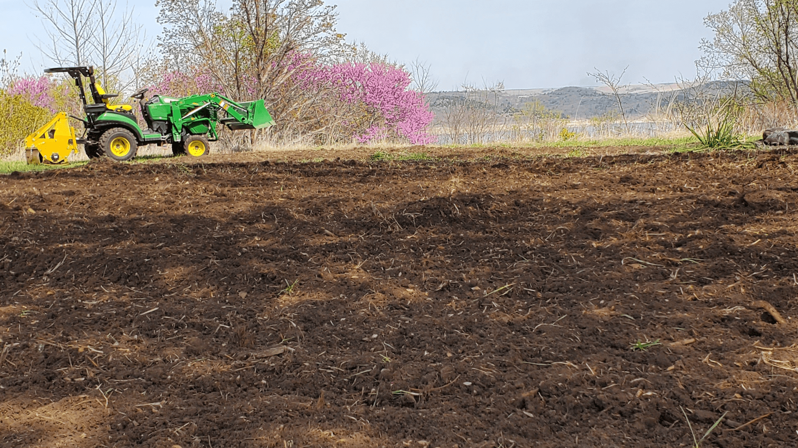 Lawn And Garden Tilling Guy on a Tractor Wamego, KS