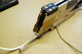 At the rear, the waste cover tape hopper.