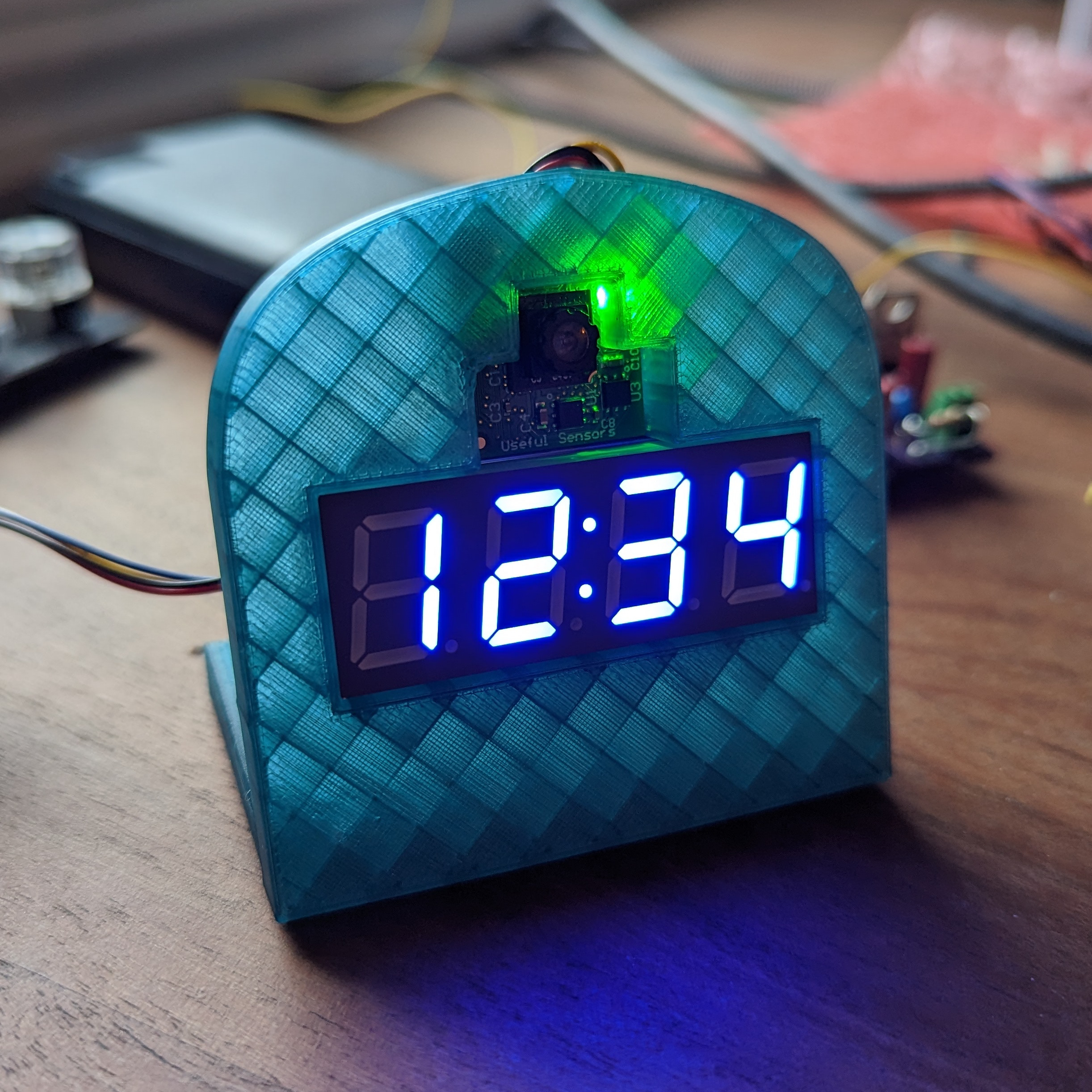Sneaky Clock Displays Wrong Time If It Catches You Looking [Hackaday