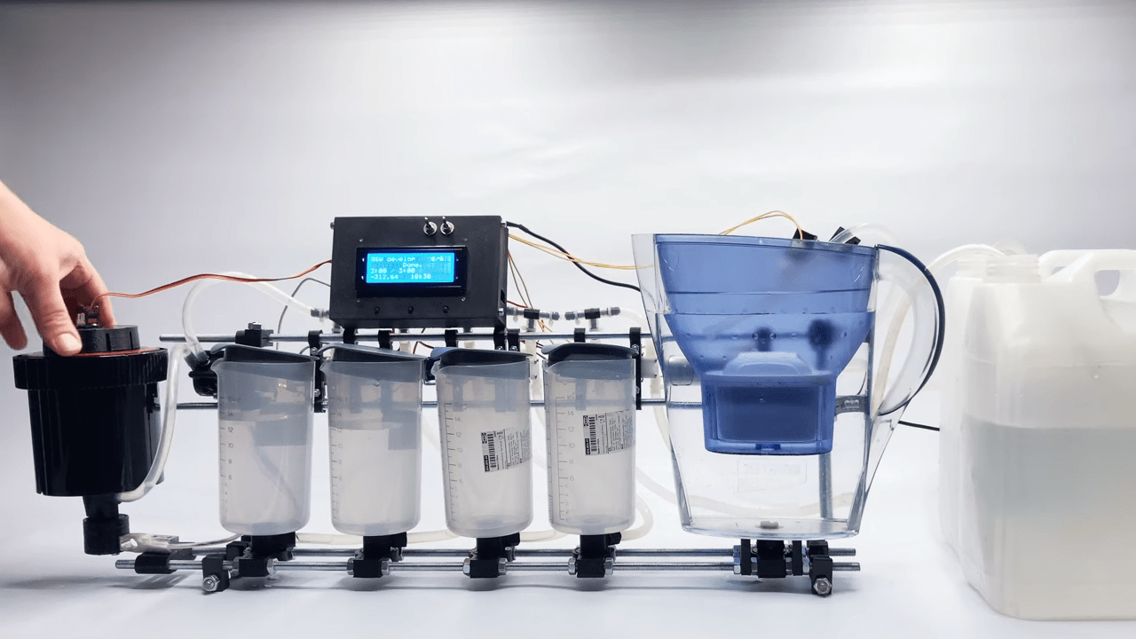 Darkroom Robot Automates Away the Tedium of Film Developing [Hackaday