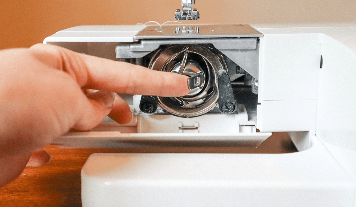 How to Wind and Insert a Bobbin into a Singer Tradition Sewing Machine Hailey Stitches