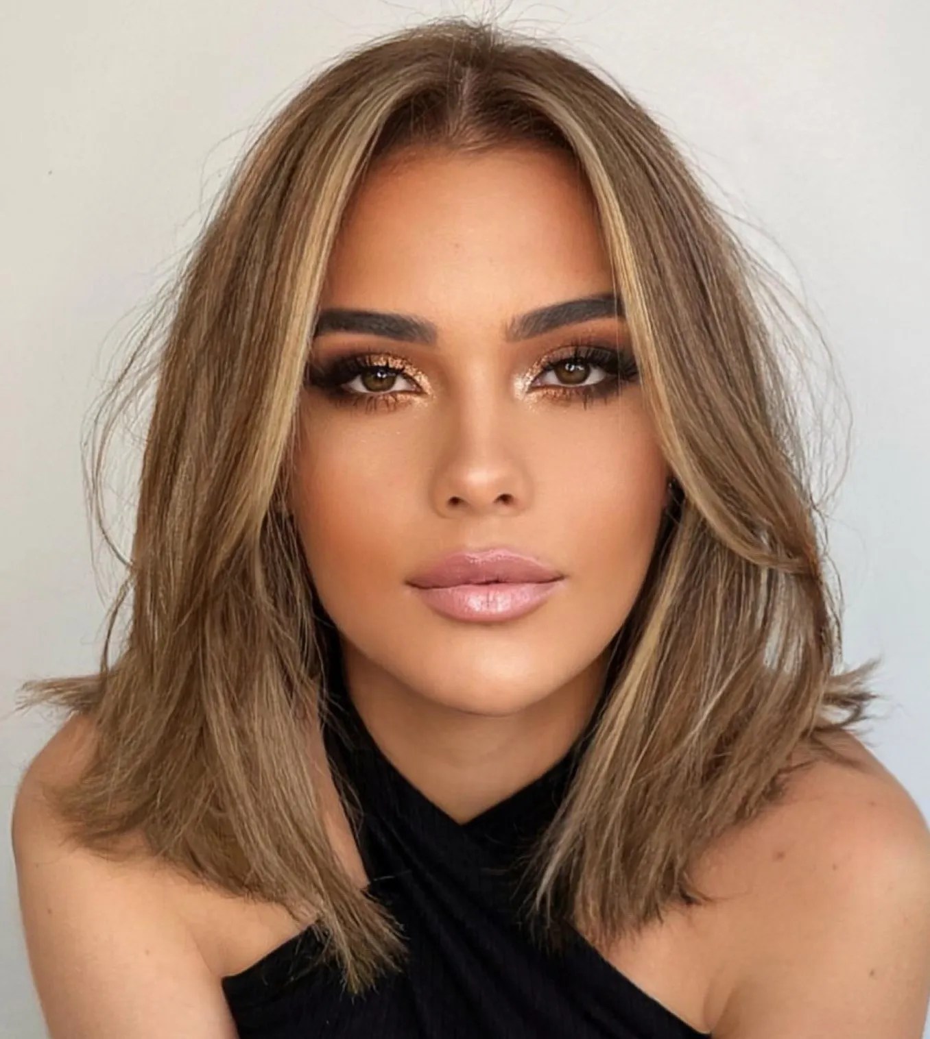 15 Low Maintenance Medium & Shoulder Length Haircuts for 2025