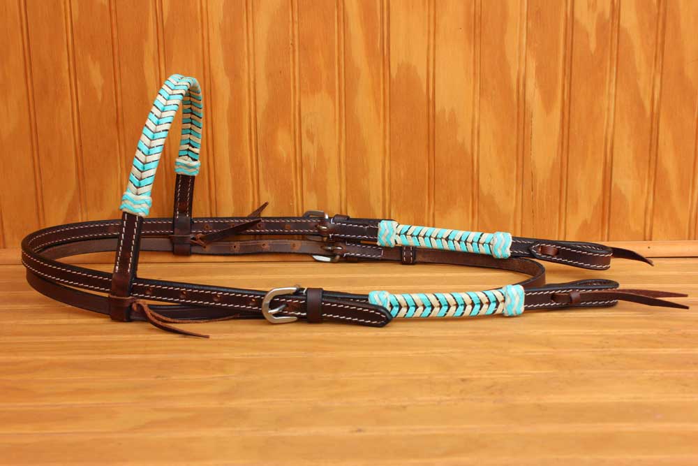 Whip stitched rawhide headstall in turquoise or purple! Half Circle Ranch