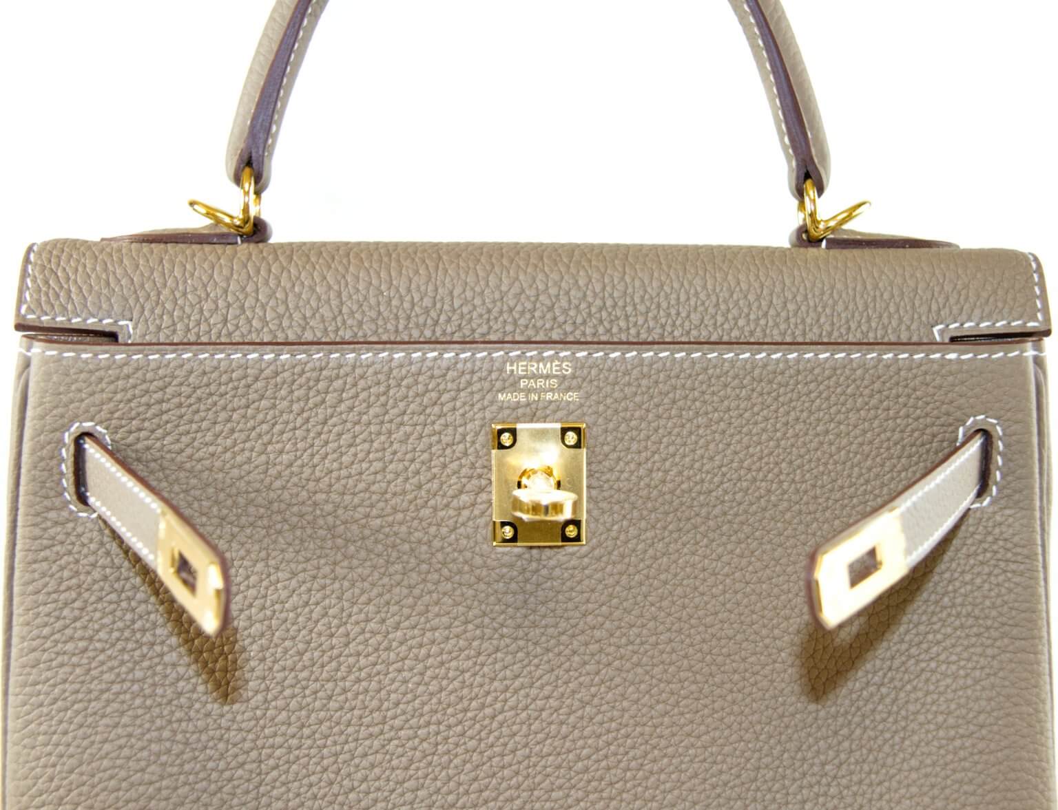 Hermès Kelly 25 Togo Etoupe Goldene HW Handbag Spa & Shop