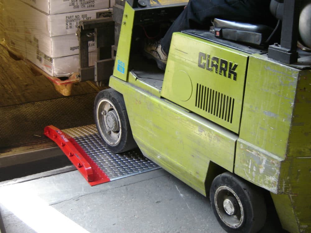 How to Unload a Truck or Container without a Loading Dock HandiRamp