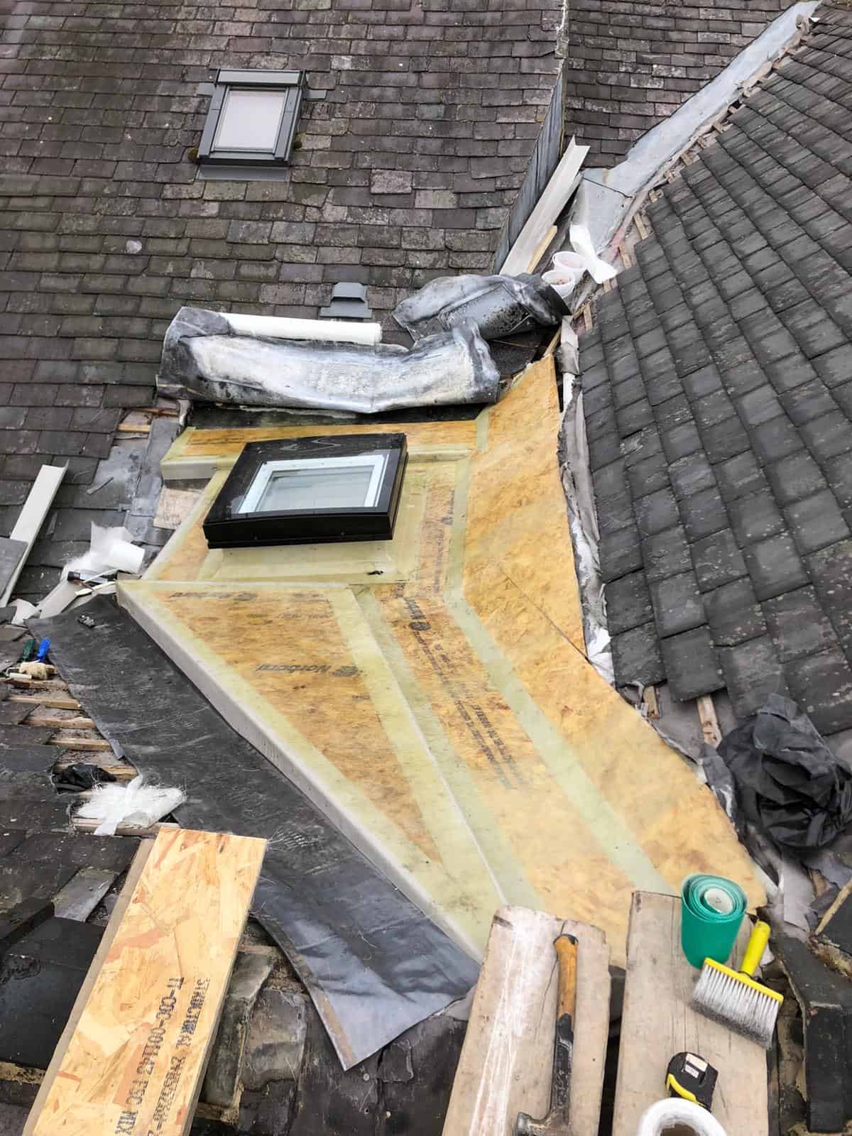 GRP roof repair and new Velux flat roof window H and M Construction