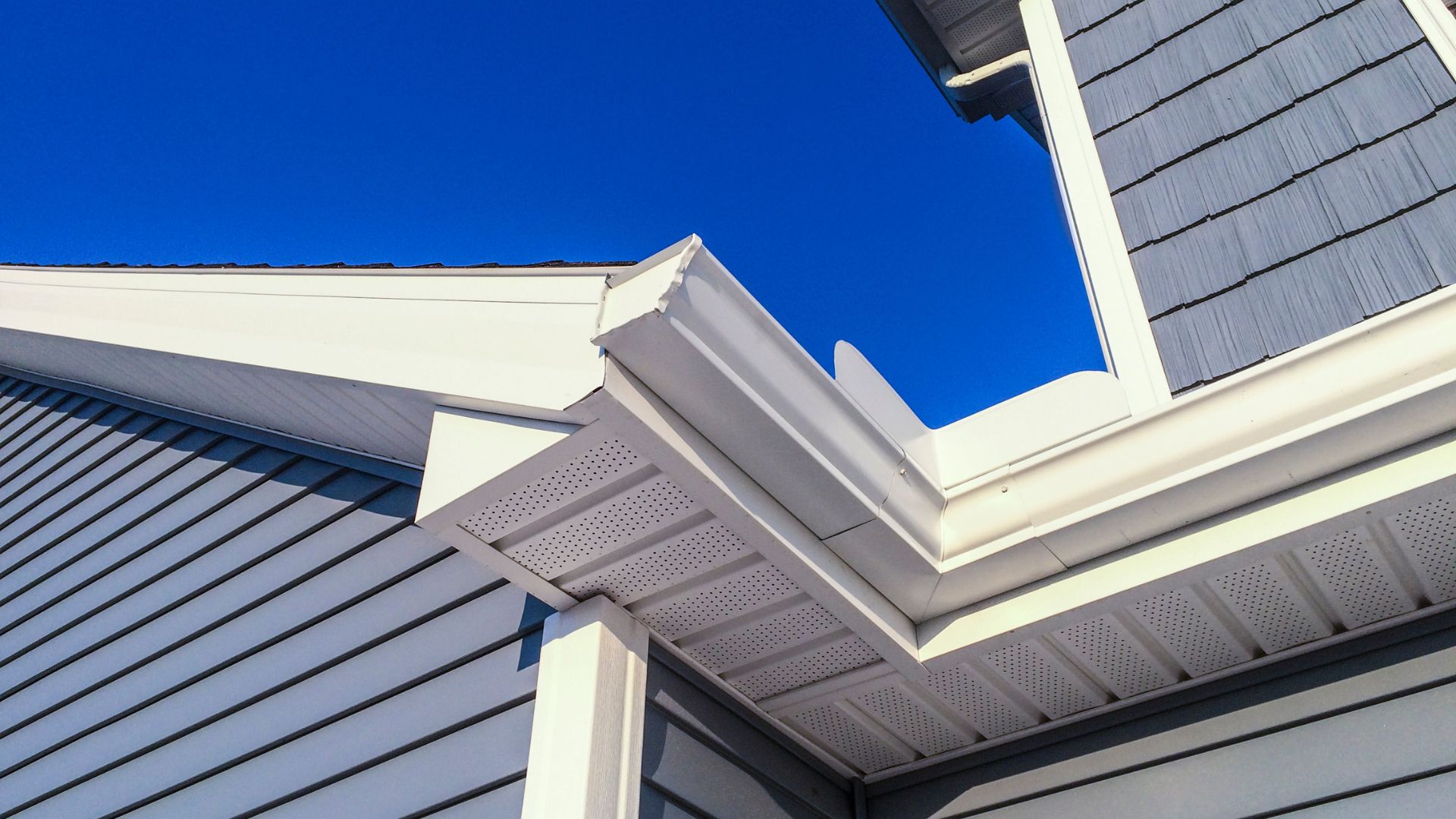 Gutter Replacement Hands on Gutters